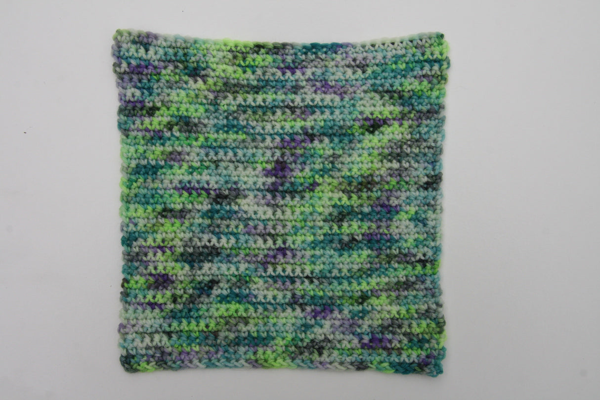 A swatch of crochet in the 4-play colorway rests on a white background.