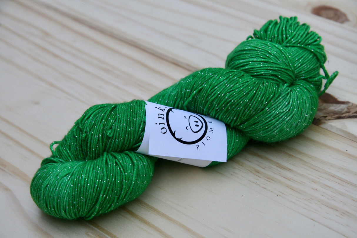 A vibrant skein showcases the subtle glimmer of the Disco base.