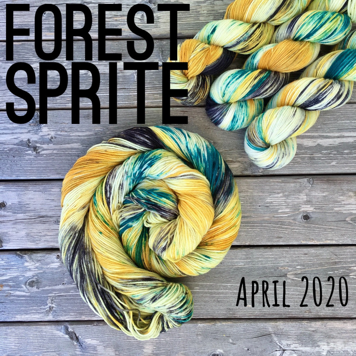 a skein of mustard yellow, light yellow yarn with teal and black speckles sits in a twisted bun stop a wooden background. Three skeins sit in the upper right corner, and black text reads "forest sprite, April 2020"