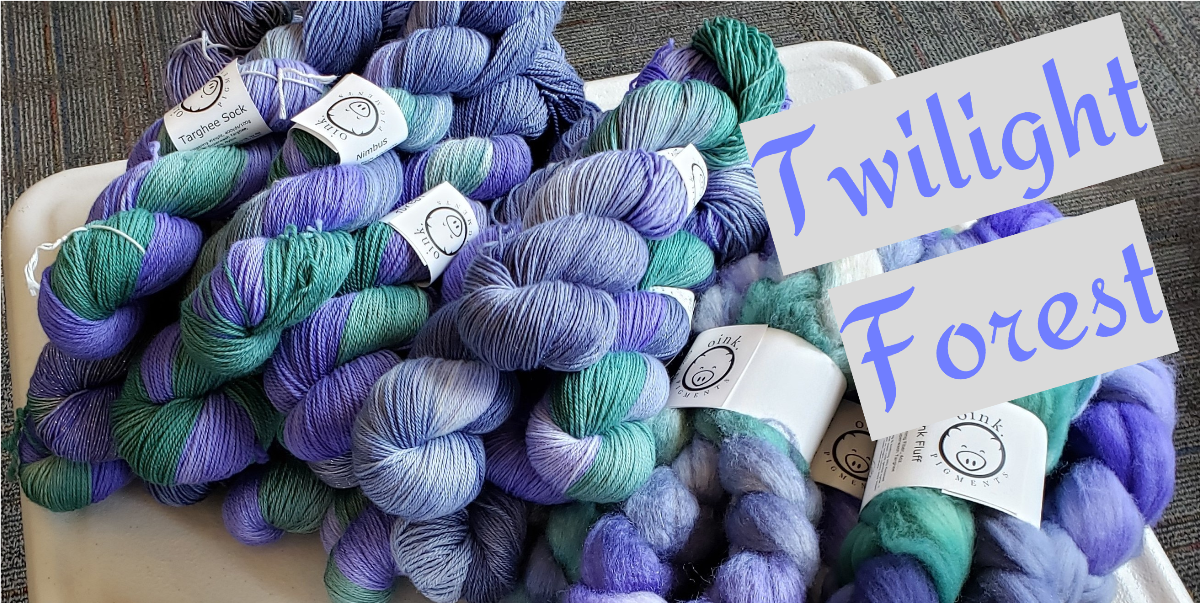 a delightful pile of twisted skeins of yarn, in various bases rests atop a white table. The yarn is colored in tones of periwinkle, lilac, purple, and a soft teal-green. Lilac text on light grey background on the right reads "twilight forest"