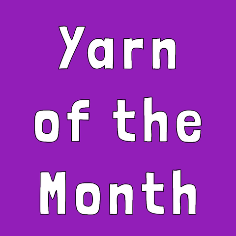 purple square with white words reading "yarn of the month"