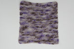 a crocheted swatch showcases the variety of color in this yarn. 